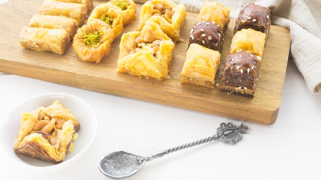 Oriental sweets or pakhlova on a wooden tray