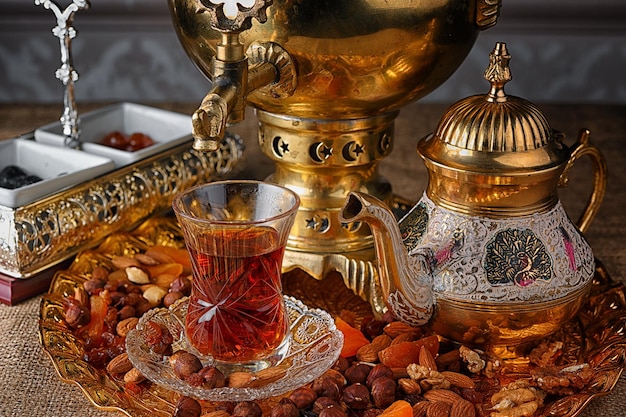 Oriental tea with nuts and oriental sweets