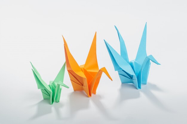 Origami crane on white 