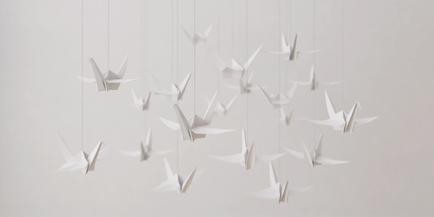 Оригами птица из белой бумаги