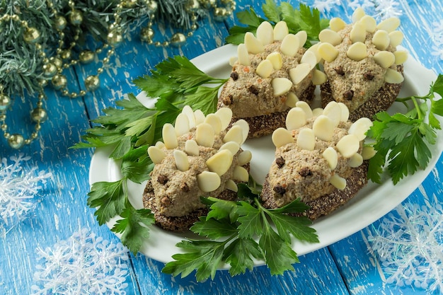 Original festive snack in form of funny hedgehogs