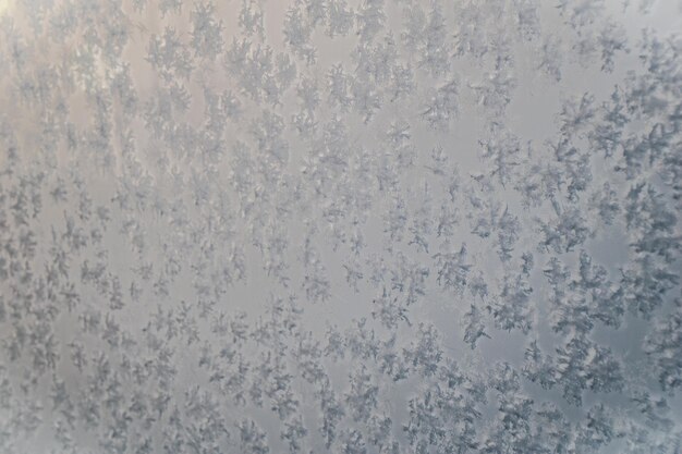 оригинальный зимний интересный абстрактный фон, нарисованный снегом и морозом