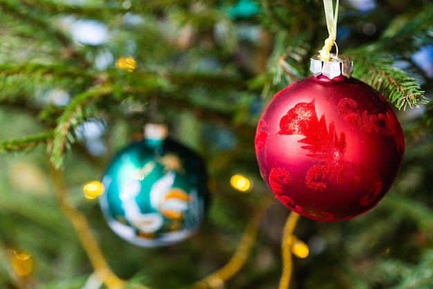 Ornamental glass balls on natural christmas tree