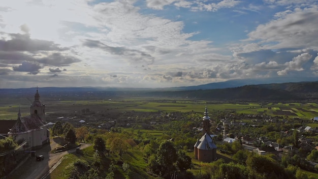 Orthodox church in carpathian mountains on amazing a small village landscape view in beautiful hills