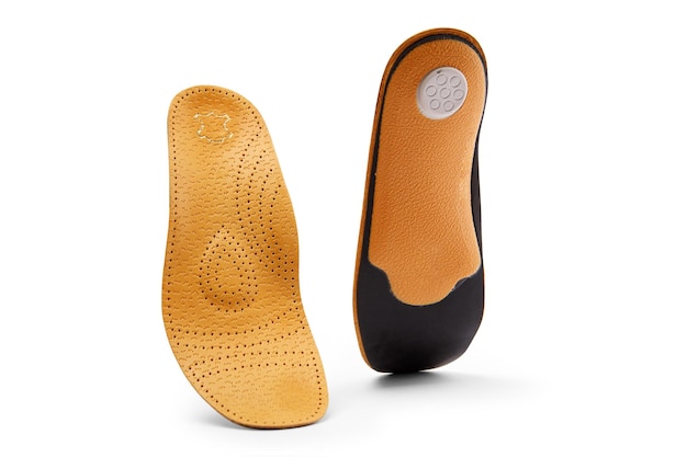 Orthopedic insole on a white background treatment of flat feet