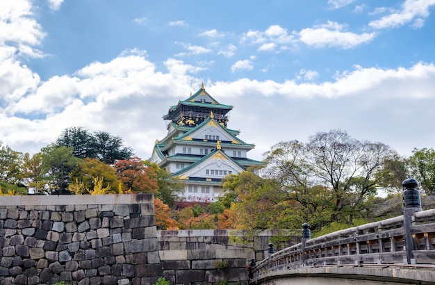 osaka castle architecture landmark with bridge gate in autumn season