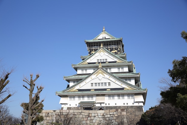 Osaka castle with blue sky , japanese castle