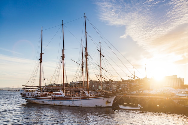 Oslo harbour with boats and yachts at twilight.