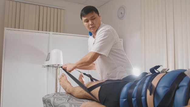 osteopathic doctor perform procedure stretching the spine chiropractic asian tibetan medicine