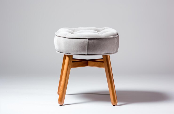 Photo an ottoman stool with a cushioned seat