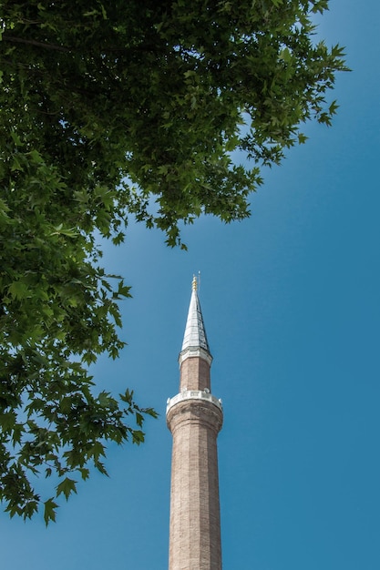 Ottoman Turkish style mosque minaret as Religious Muslim temple architecture