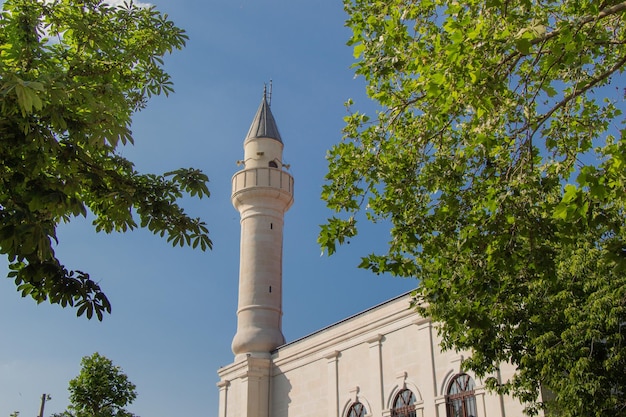 Ottoman Turkish style mosque minaret as Religious Muslim temple architecture