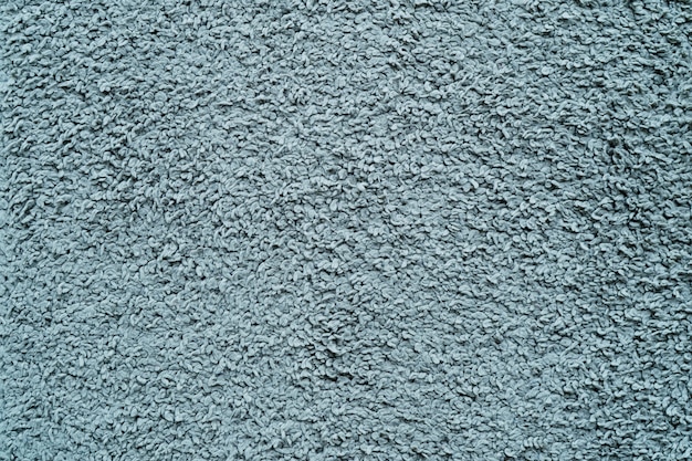 Oud blauw tapijt voor achtergrond en textuur.