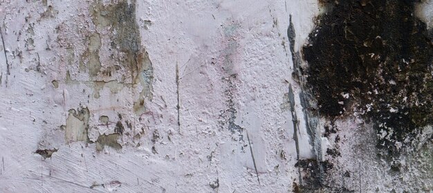 Oud cement vol vlekken en krassen kan als achtergrond worden gebruikt