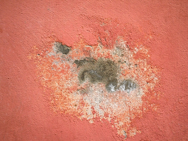 Foto oude achtergrond en textuur de muur van het oude gebouw cement en oude verf