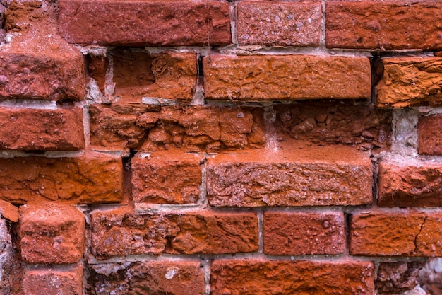 Oude bakstenen muur met witte en rode bakstenen achtergrond