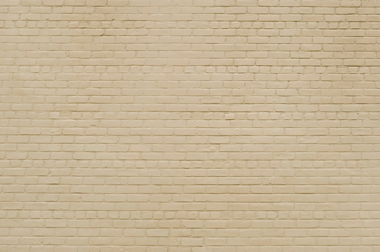 Foto oude beige bakstenen muurtextuur als achtergrond