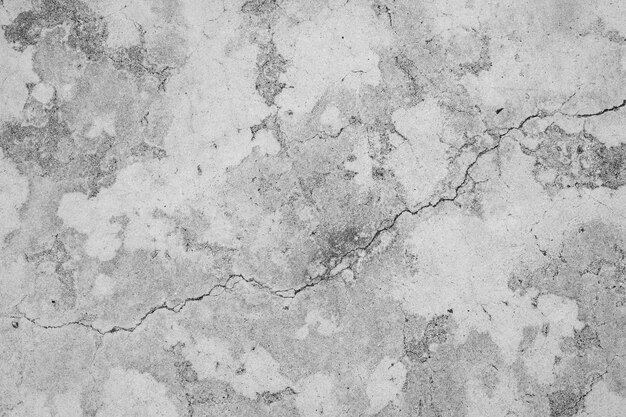 Oude betonnen muur in zwart-wit kleur cement muur gebroken muur achtergrond textuur