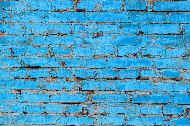 Oude blauw geschilderde vintage bakstenen muur achtergrond