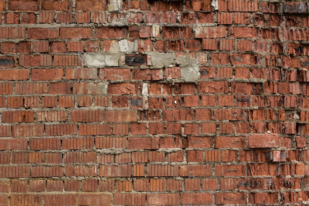 Oude bruine bakstenen muur textuur. Grunge-achtergrond