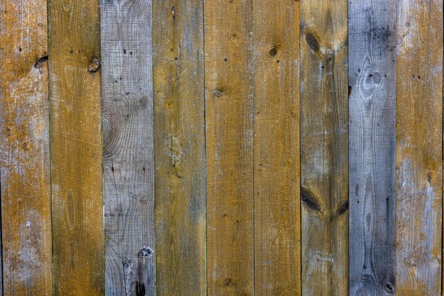 Oude, droge, verweerde grijze en bruine houten planken boordoppervlak full frame achtergrond en textuur