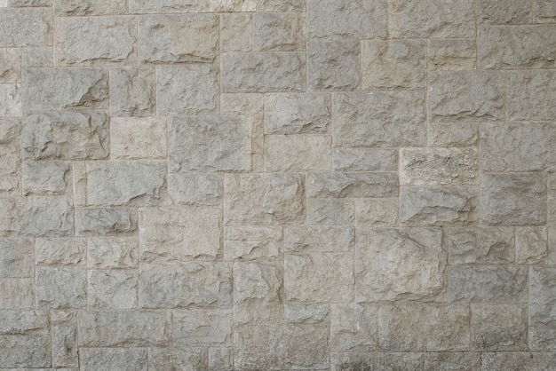 Oude granieten stenen muur textuur achtergrond