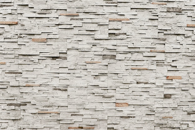 Oude grijze de muur van de granietsteen textuur als achtergrond