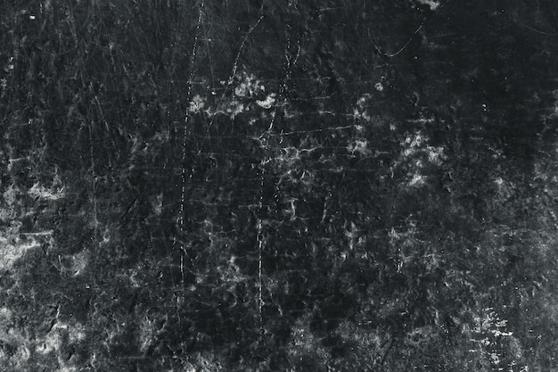 Oude grunge verouderde vuile doorstane zwarte de textuur abstracte achtergrond van de steenmuur