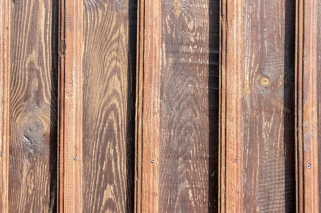 Oude houten muur met verticale planken