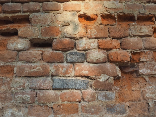 Oude rode bakstenen muur achtergrond