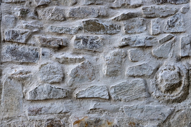 Oude stenen muur buitenshuis