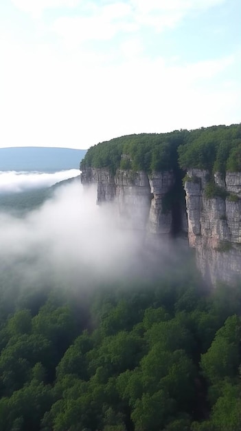 ountains in clouds at sunrise in summer