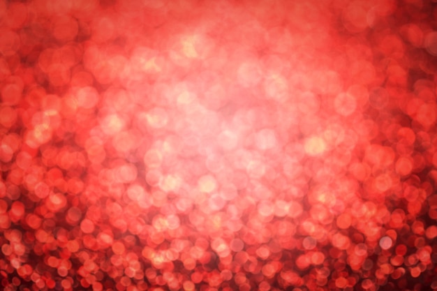 Out of focus red bokeh. Festive background for christmas, new year, wedding.