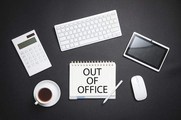 Out Of Office on notepad Business concept