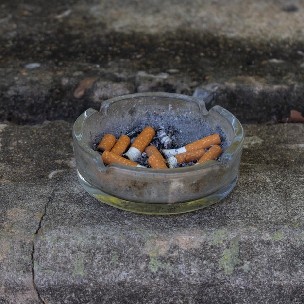 Outdoor ashtray glass toxic cigarette stop