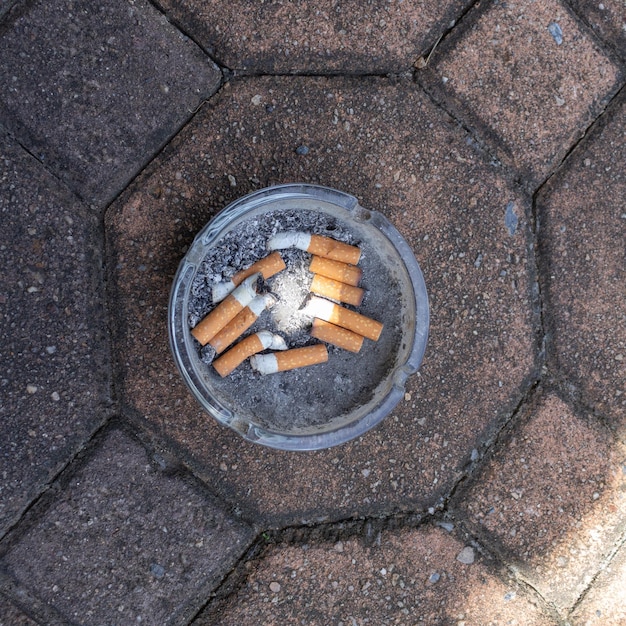 Photo outdoor ashtray glass toxic cigarette stop