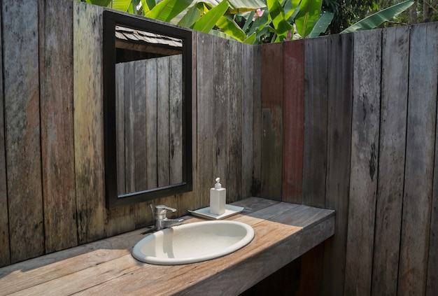Outdoor bathroom with tropical garden