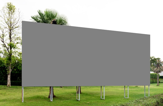 Outdoor billboard background in garden with gray background mock up clipping path