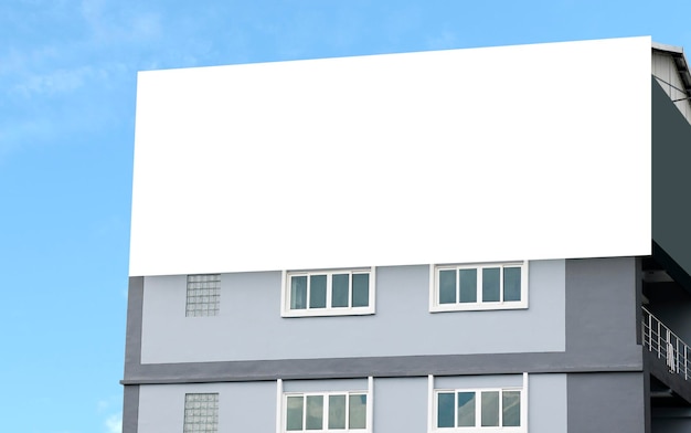 Outdoor billboard on building with white background mock up