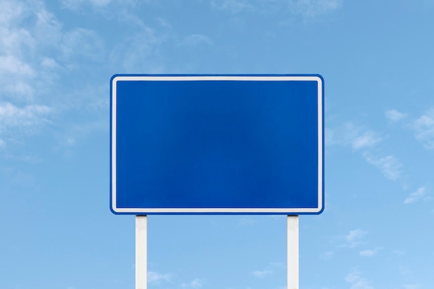 Outdoor blue sign on blue sky background