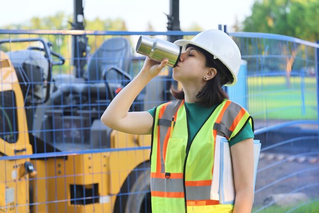 Outdoor builder woman portrait construction worker