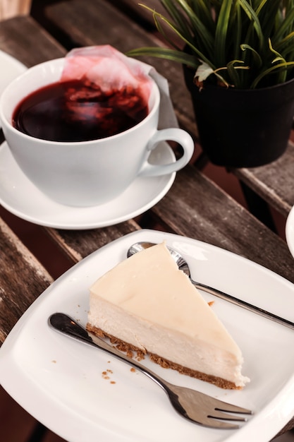 Outdoor cafe, autumn, red tea, cheesecake, dessert 