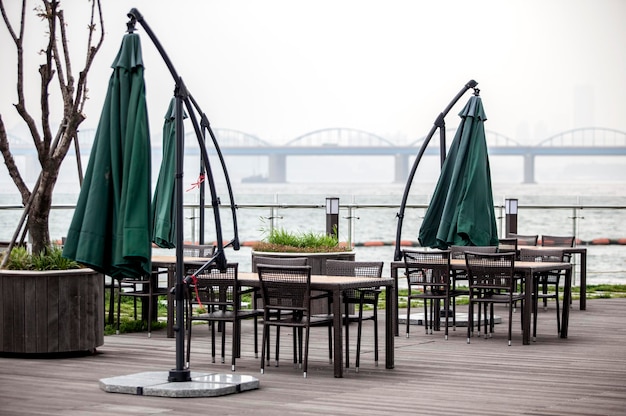 outdoor cafe by han river against sky