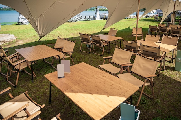 Outdoor camping tent and some tables and chairs