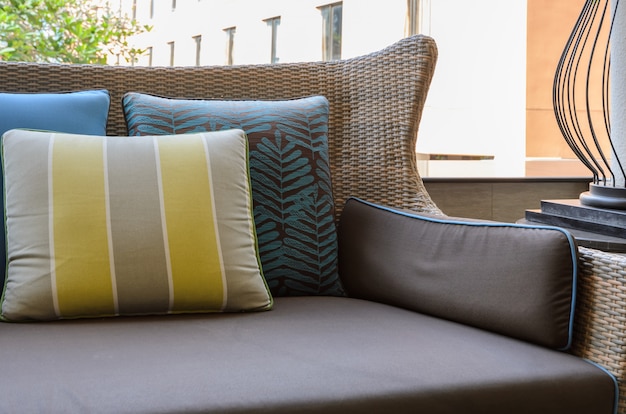 Outdoor deck with pillows on sofa