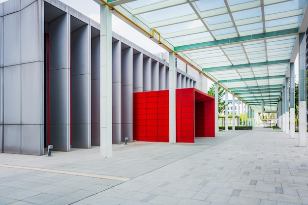 Outdoor empty corridor with garden in the modern office building