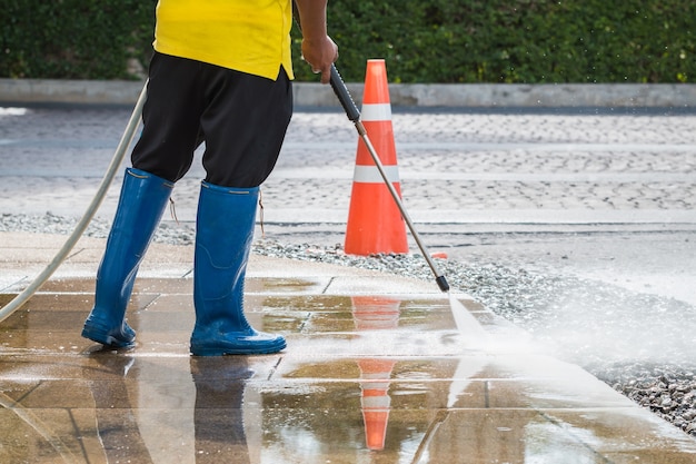 Outdoor floor cleaning with high pressure water jet