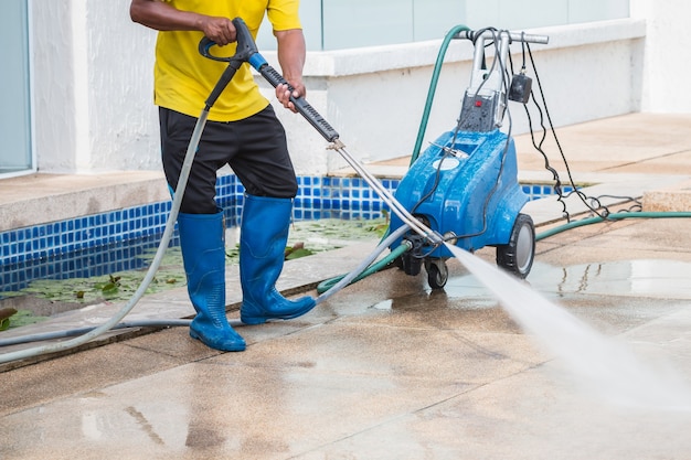 Photo outdoor floor cleaning with high pressure water jet