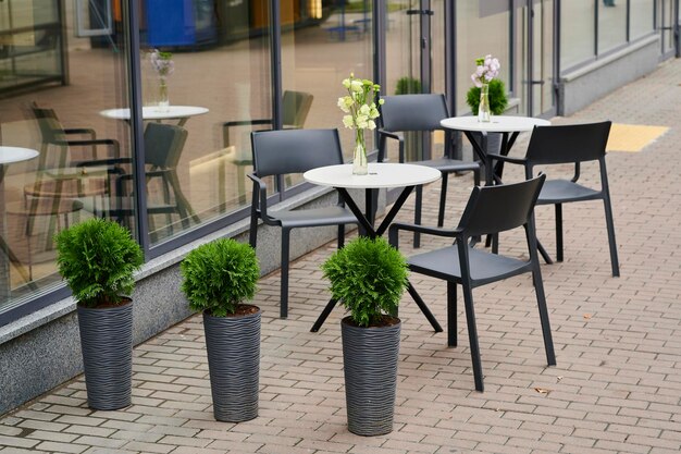 Outdoor furniture in the outdoor terrace cafe tables and chairs for visitors