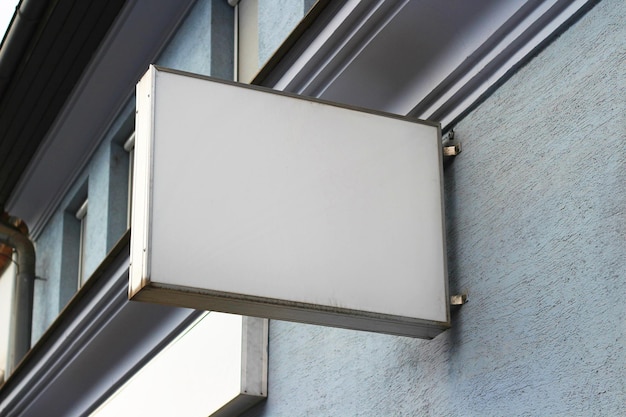 Outdoor hanging mounted sign on the wall mockup template Signboard mock up for logo presentation